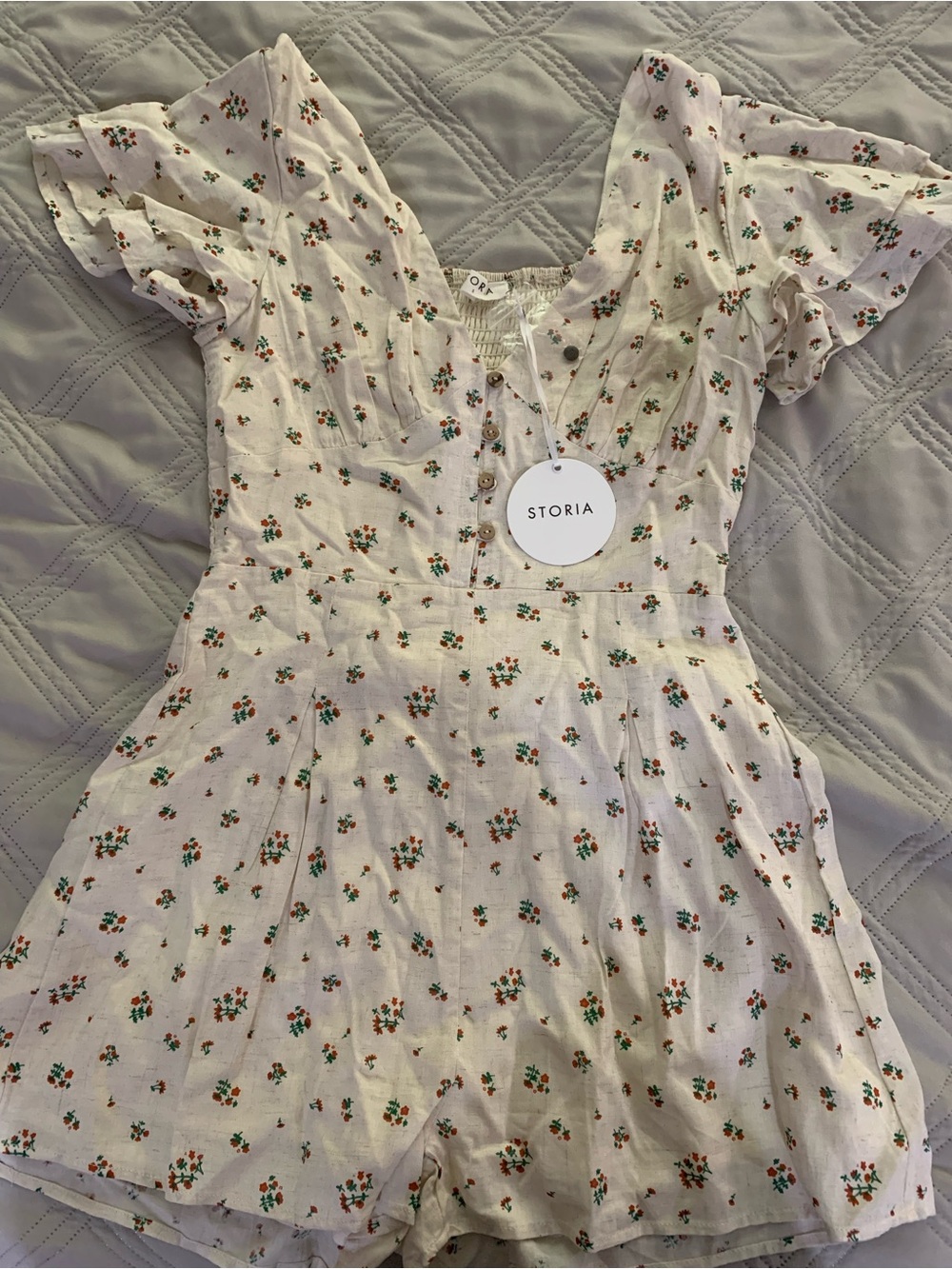 Storia Cream Mini Romper with Orange and Green Floral Print